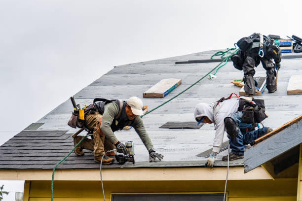 Professional Gutter Installation technician working in Russell, MN